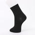Dark gray ankle sock displayed on a mannequin foot