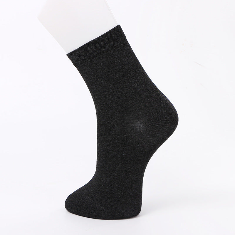 Dark gray ankle sock displayed on a mannequin foot