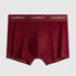 Burgundy men's boxer briefs with white 'CandiDacY' text on elastic waistband against light background