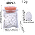A transparent jar-shaped bag filled with pure white speckled eggs. Dimensions: 19cm/7.48in height, 13cm/5.11in width, 4cm/1.57in depth. Eggs: 2.5cm/0.98in x 1.5cm/0.59in.

