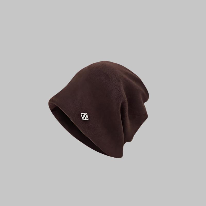 Rich brown beanie with relaxed style and discreet brand emblem, perfect for fall fashion
