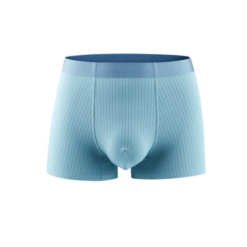 Light blue boxer briefs with navy waistband against white background. Ribbed texture with contoured front panel design