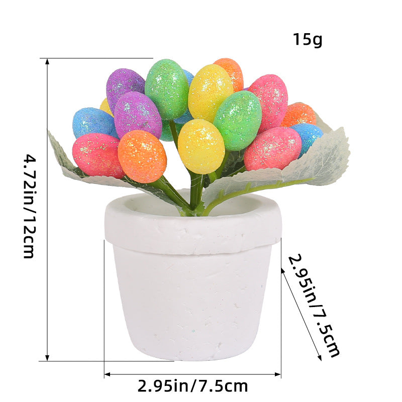 A close-up of a white ceramic pot filled with multicolored artificial eggs, with measurement annotations showing the height and width of the decorative item.