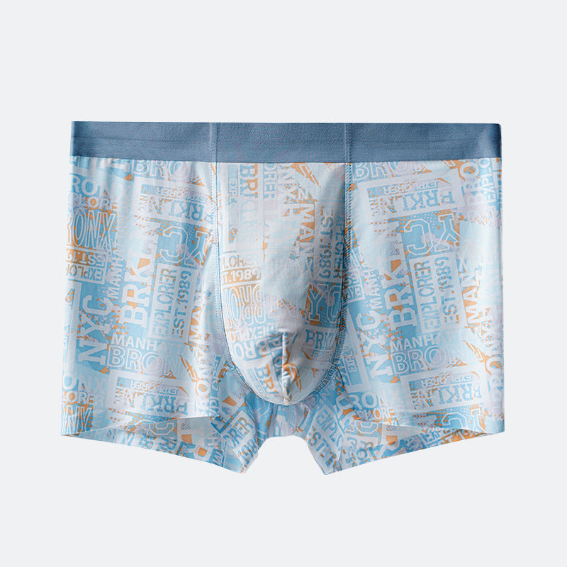 Men's boxer briefs in light blue with modern typography pattern and blue waistband, showing brand text elements