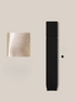 Product layout showing black leg warmer with fabric texture detail