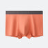 Salmon/peach-toned men's boxer briefs with centered pouch, soft fabric, and dark gray waistband