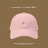 Pink baseball cap with small embroidered corgi logo, casual summer style