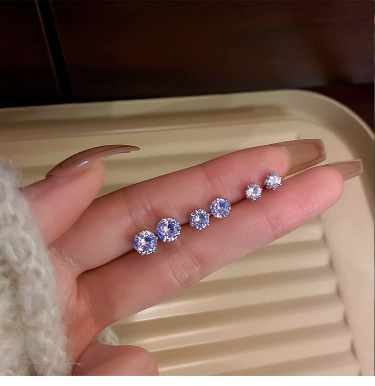 Diamond stud earrings in multiple sizes, ranging from 3mm to 7.5mm