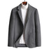 A gray wool blazer displayed with a white turtleneck underneath