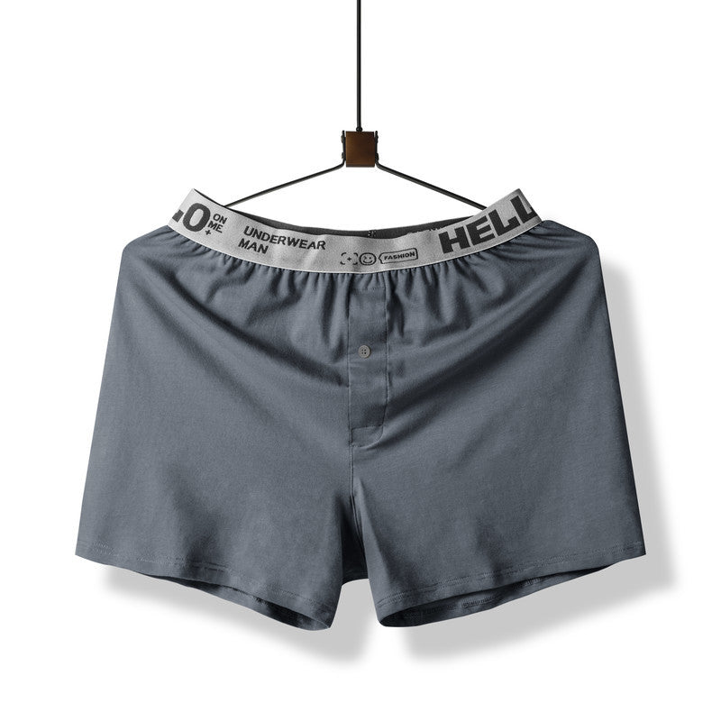 Gray boxer short with elastic waistband reading 'HELLO' displayed on hanger against white background
