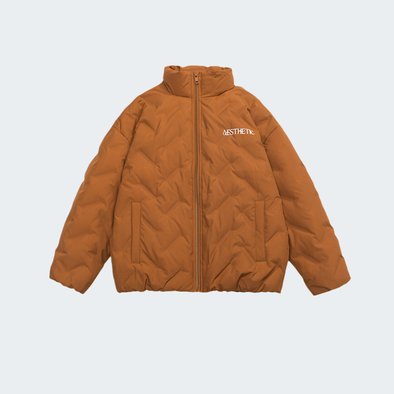 Camel brown Aesthetic quilted puffer jacket with zip front closure and diagonal quilting pattern displayed flat against white background