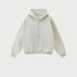 Light heather gray oversized zip-up hoodie with front kangaroo pocket and ribbed cuffs displayed on light gray background