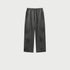 Charcoal grey drawstring pants displayed flat showing distressed pattern and side pockets. Features elastic waistband and relaxed fit