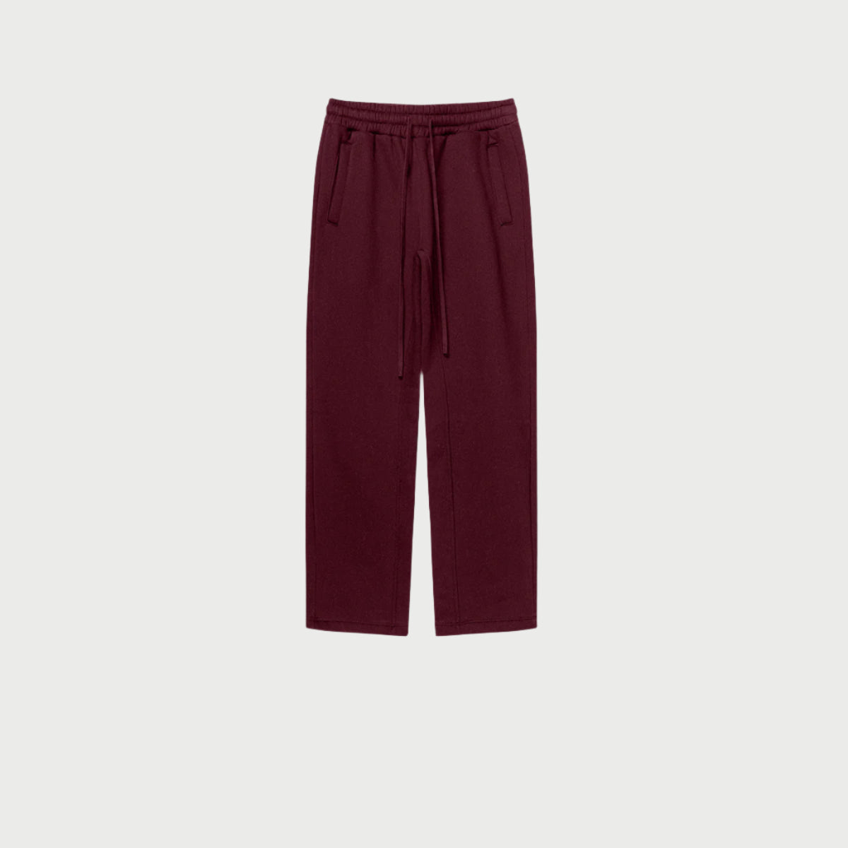 Burgundy sweatpants with elastic waistband, drawstring and side pockets displayed on light gray background