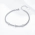 Silver version of heart charm bracelet with three CZ heart accents.