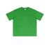 Bright green oversized t-shirt with crew neck and short sleeves, featuring clean minimalist design and white brand tag at collar against white background