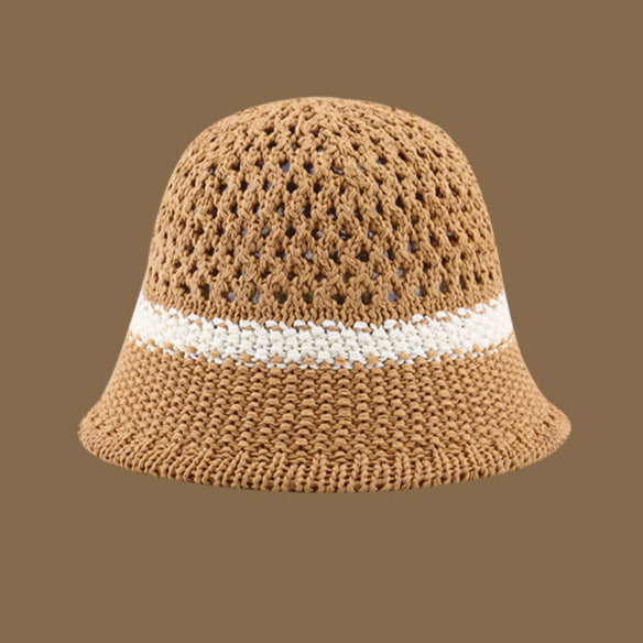  A khaki straw bucket hat with an open-weave top and a contrasting white stripe, offering a breathable and stylish summer look.
