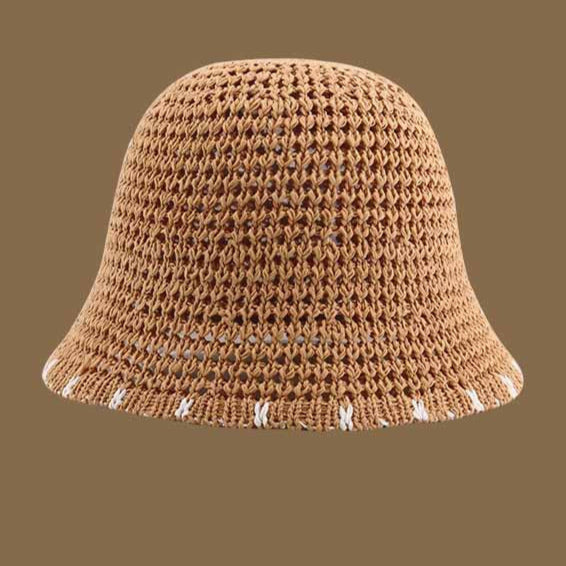 A khaki-colored straw bucket hat with a breathable open-weave design and white-trimmed brim, perfect for beach outings.