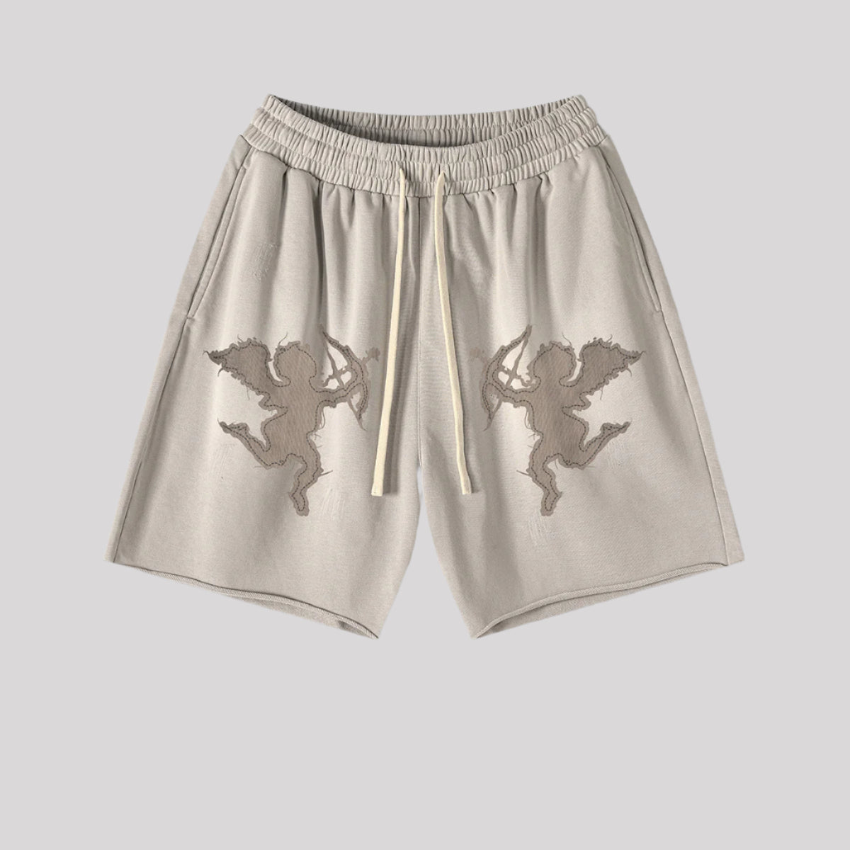Beige cotton shorts with tonal cupid embroidery and elastic waistband, studio product shot