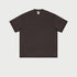 Dark brown oversized t-shirt displayed flat against light gray background with branded tag visible