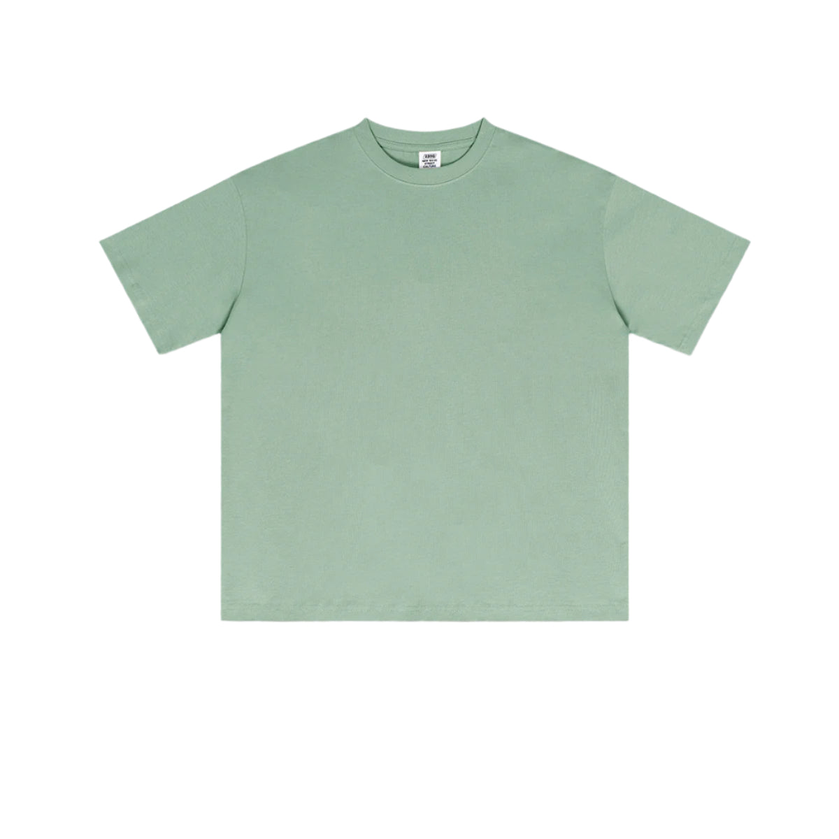 Mint green oversized t-shirt with crewneck design, short sleeves and relaxed fit, displaying tag at collar and smooth cotton fabric texture