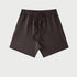 Dark brown drawstring shorts displayed flat against light gray background with elastic waistband