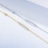 Side-by-side comparison of gold and silver bar bracelets with CZ accents.