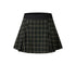 Dark green and black plaid pleated mini skirt with elastic black waistband against white background