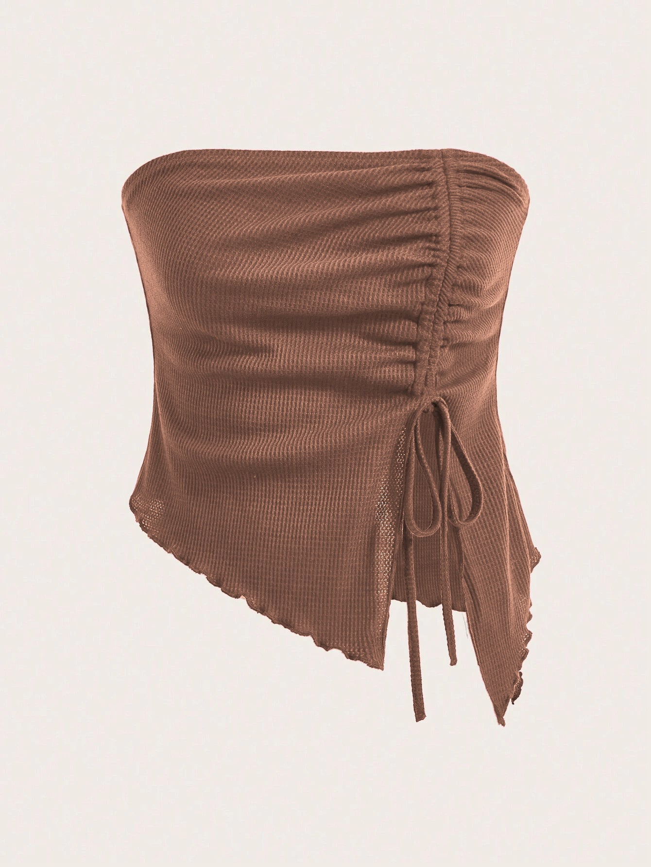 A brown ribbed strapless top with asymmetric design and adjustable tie detail shown against clean white background
