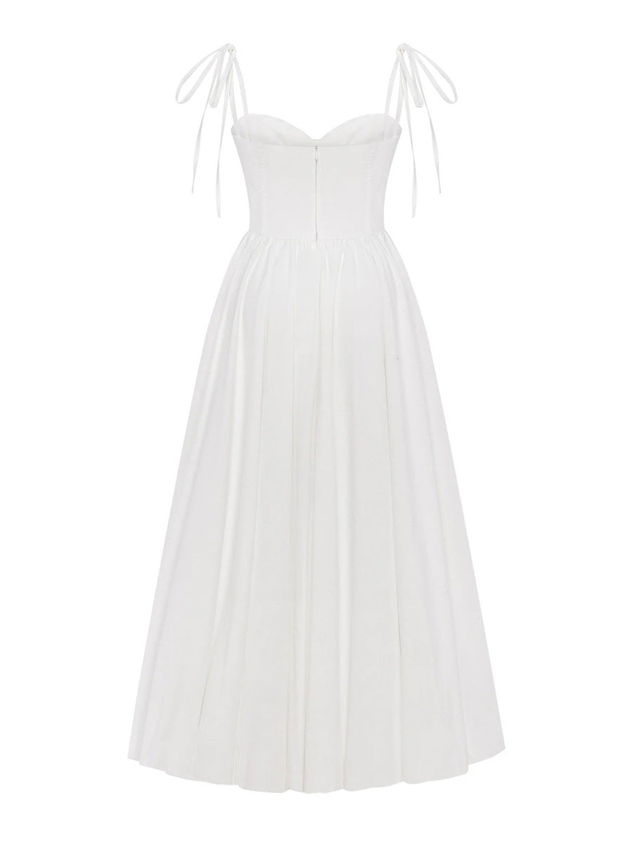 White dress with thin straps on a white background