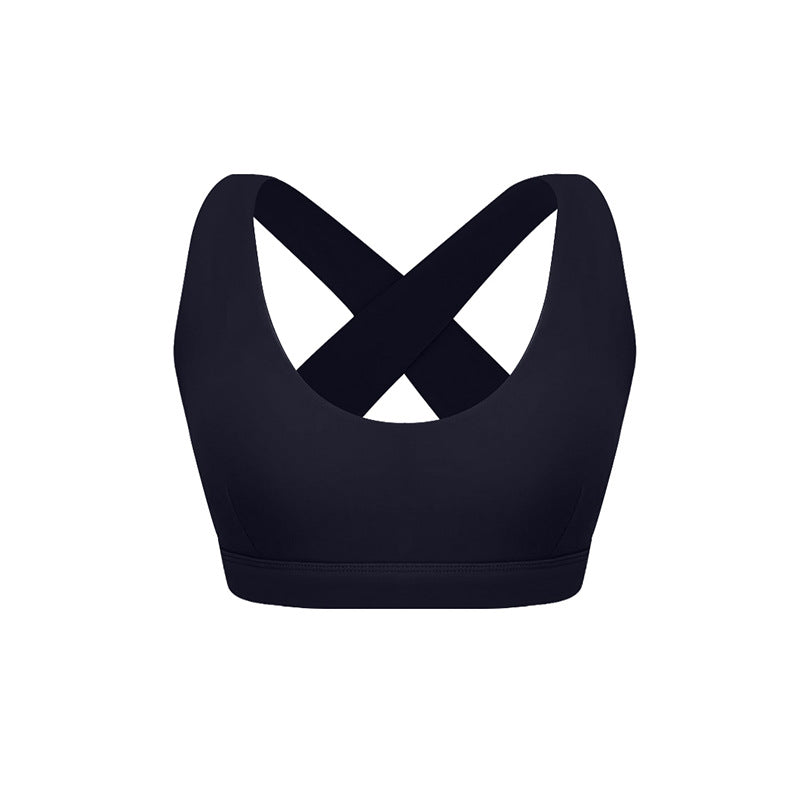 Black sports bra with crossed back straps and scoop neckline