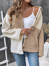 Two-tone beige and cream sherpa jacket with button front over white tank top and jeans