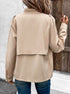 Women's beige utility jacket with front pockets and button details, styled casually with crop top