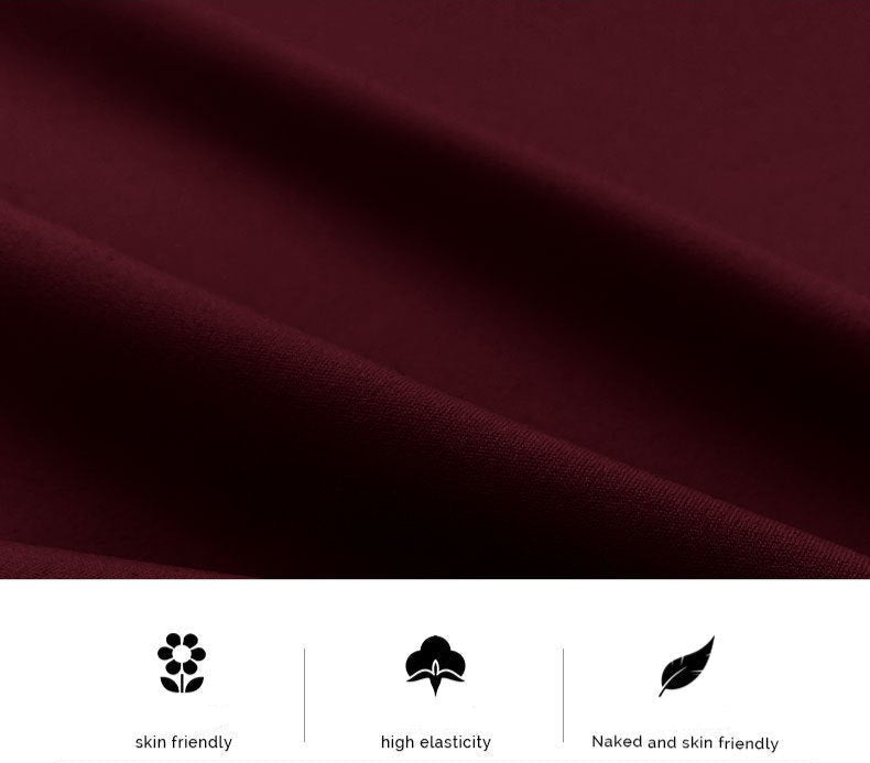 Close-up of burgundy performance fabric texture with icons highlighting skin-friendly material, high elasticity, and comfort features