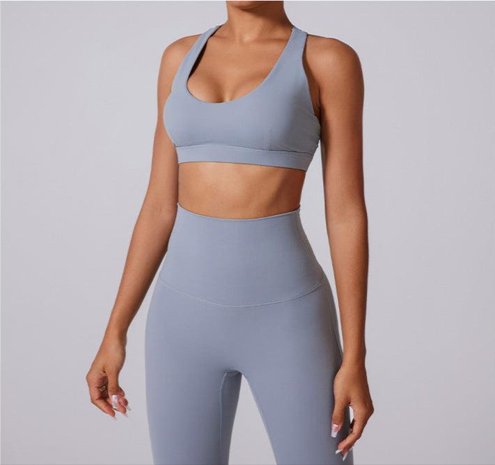 Front view of gray sports bra and leggings set with 'Gentle Support' text overlay