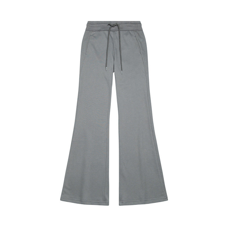 Gray flared sweatpants with drawstring waist and side pockets