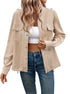 Women's beige utility jacket with front pockets and button details, styled casually with crop top