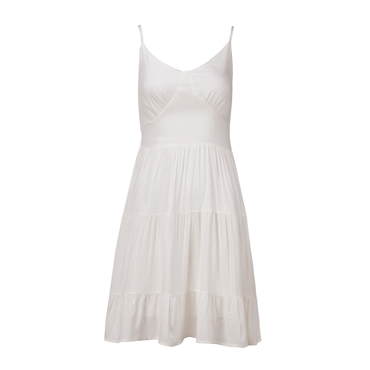 White cotton sundress with gathered waist, layered skirt, and pink denim jacket, creating playful summer fashion look