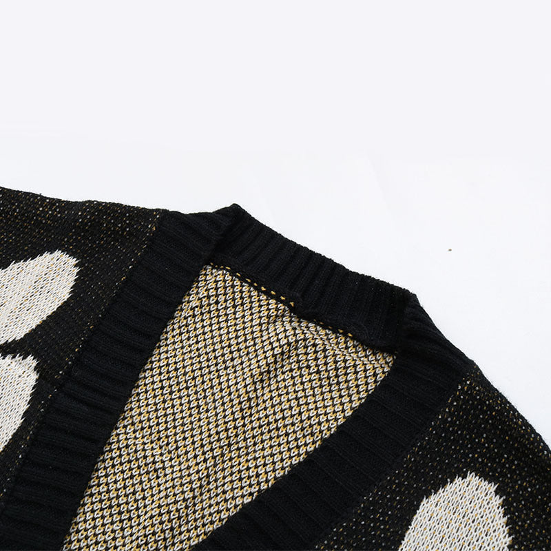 Close-up of the inside knit pattern of the black daisy cardigan