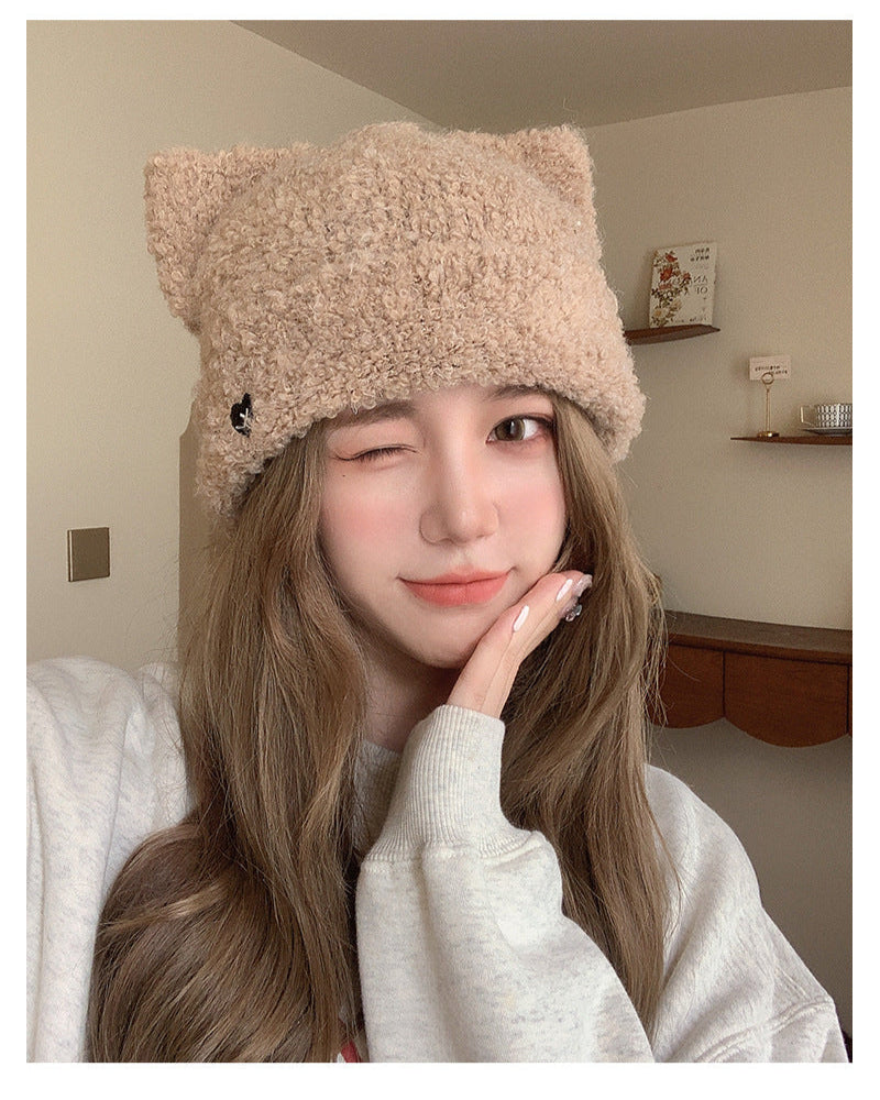 Beige Cat Ear Beanie Hat on Model – Cozy beige beanie hat with cat ears, worn by a model for a chic winter look