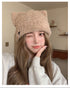 Beige Cat Ear Beanie Hat on Model – Cozy beige beanie hat with cat ears, worn by a model for a chic winter look
