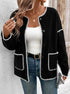 Women's black cardigan with white contrast stitching detail and front pockets