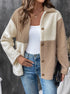 Two-tone beige and cream sherpa jacket with button front over white tank top and jeans