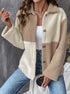 Two-tone beige and cream sherpa jacket with button front over white tank top and jeans