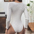 A back view of the striped bodysuit, showing its fitted design and long sleeves.
