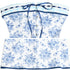 A white strapless mini dress with blue floral and butterfly print, featuring ribbon trim and button front closure, displayed flat against white background