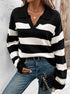 Striped black and white collared sweater paired with jeans and gold necklaces
