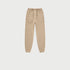 Beige jogger sweatpants with elastic waistband, drawstring and side pockets on white background