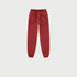 Burgundy jogger sweatpants with drawstring waist, side pockets and elastic ankle cuffs on white background