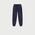 Navy blue jogger sweatpants with drawstring waist, side pockets and elastic cuffs on white background
